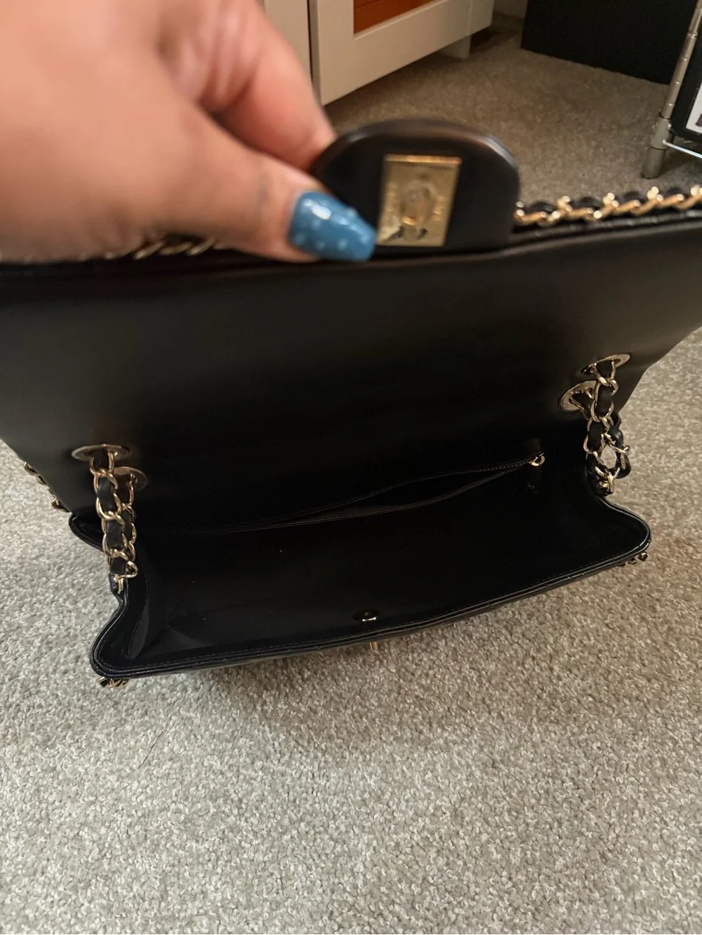 CHANEL Black Quilted Leather Shoulder Bag with Gold Hardware